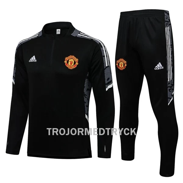 Manchester United Champions League Träningsträningsoverall Quarter-Zip Barn 22/23 Svart vit